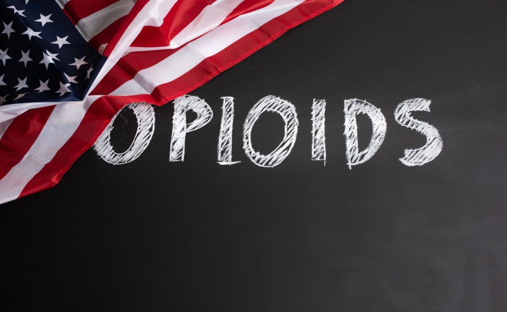 American flag with the word 'opioid's next to it